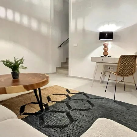 Close To The Marina And Beaches Of Sotogrande, Experience Sophistication In Contemporary Four-bedroom Frontline Golf Townhouse In The Club