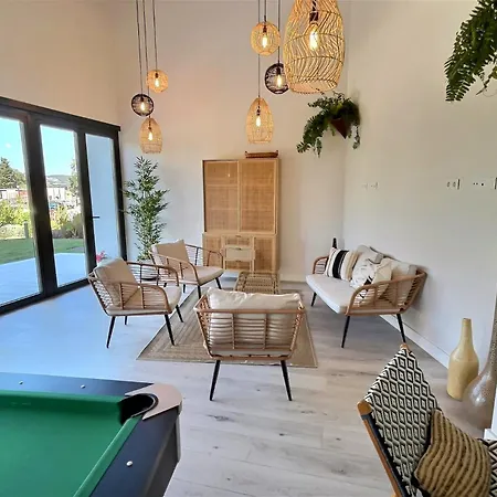 Close To The Marina And Beaches Of Sotogrande, Experience Sophistication In Contemporary Four-bedroom Frontline Golf Townhouse In The Club