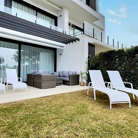 Close To The Marina And Beaches Of Sotogrande, Experience Sophistication In Contemporary Four-bedroom Frontline Golf Townhouse In The Club *
