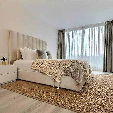Close To The Marina And Beaches Of Sotogrande, Experience Sophistication In Contemporary Four-bedroom Frontline Golf Townhouse In The Club